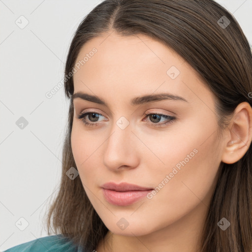 Neutral white young-adult female with long  brown hair and brown eyes