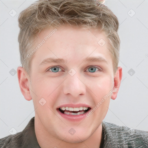 Joyful white young-adult male with short  brown hair and blue eyes