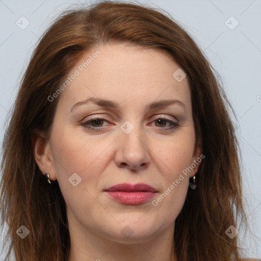 Joyful white adult female with long  brown hair and brown eyes