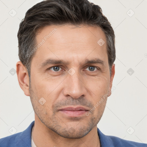 Neutral white adult male with short  brown hair and brown eyes