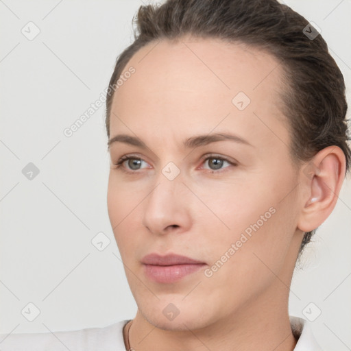 Neutral white young-adult female with short  brown hair and brown eyes