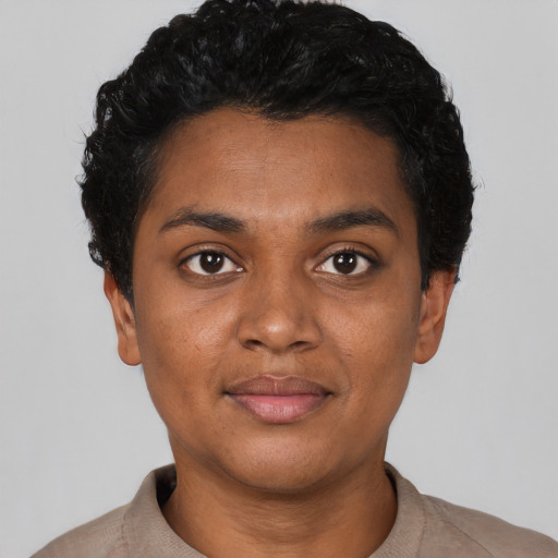Neutral black young-adult female with short  black hair and brown eyes