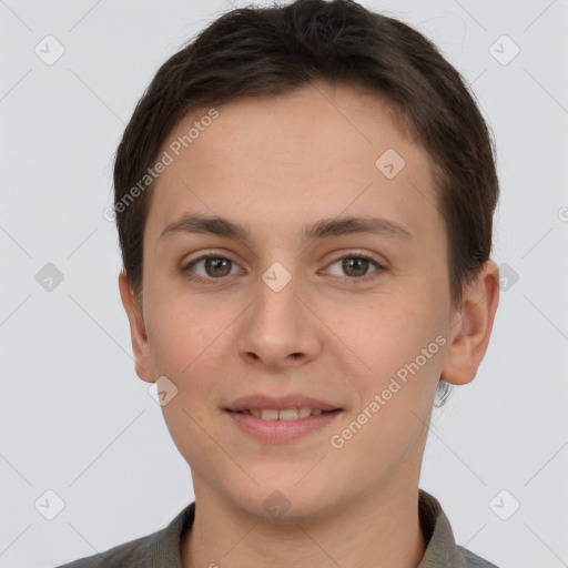 Joyful white young-adult female with short  brown hair and brown eyes