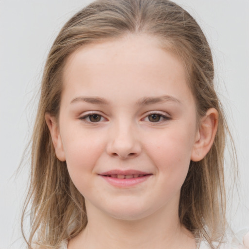 Joyful white child female with medium  brown hair and grey eyes