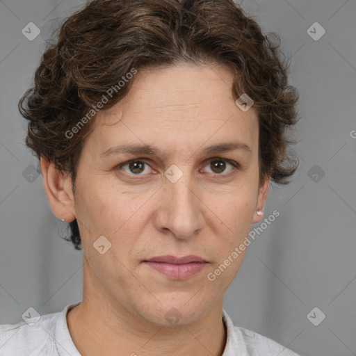 Joyful white adult female with short  brown hair and brown eyes