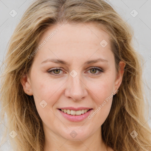 Joyful white young-adult female with long  brown hair and green eyes