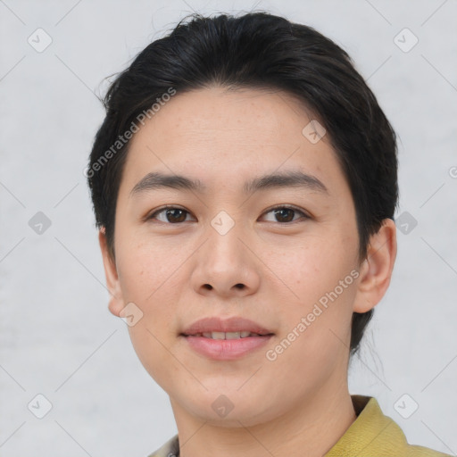 Joyful asian young-adult female with short  brown hair and brown eyes
