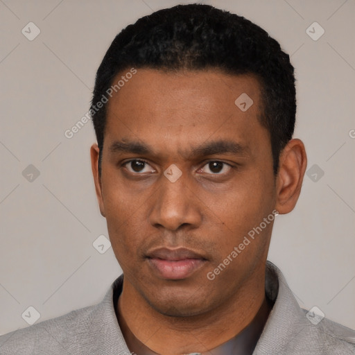 Neutral black young-adult male with short  black hair and brown eyes