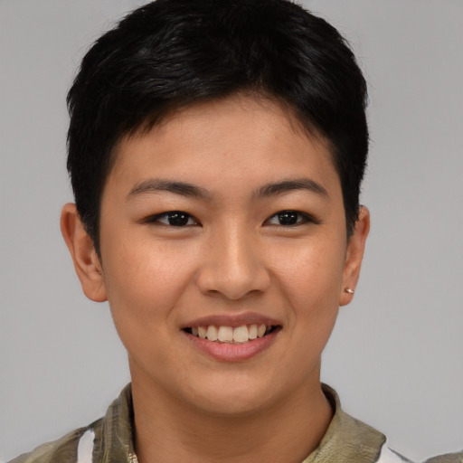 Joyful asian young-adult female with short  brown hair and brown eyes