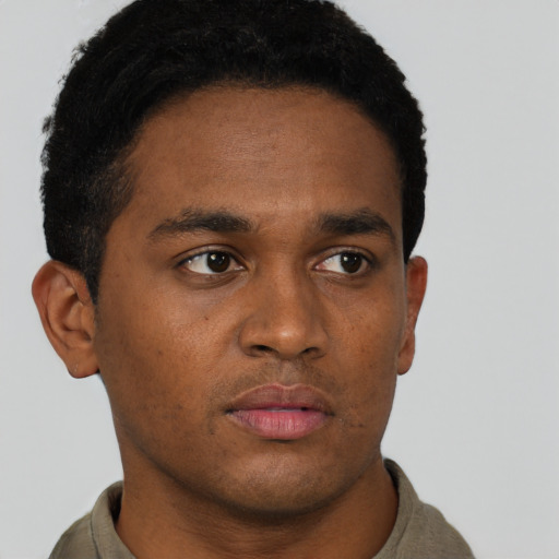 Neutral black young-adult male with short  black hair and brown eyes