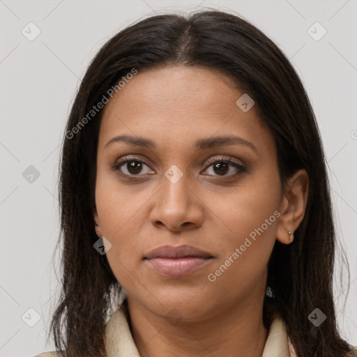 Joyful latino young-adult female with long  brown hair and brown eyes