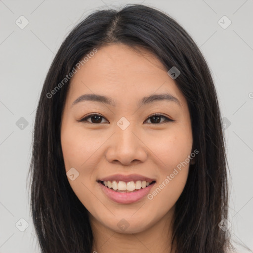 Joyful latino young-adult female with long  brown hair and brown eyes