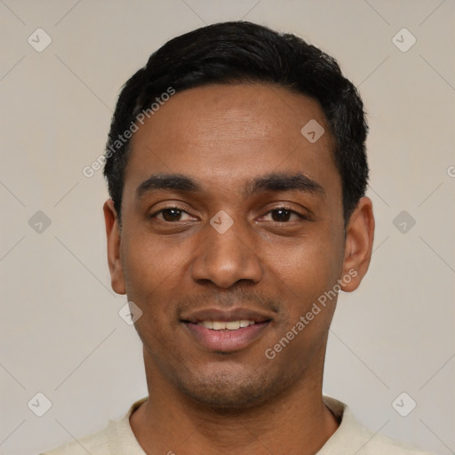 Joyful black young-adult male with short  black hair and brown eyes