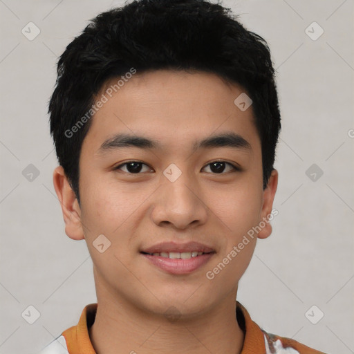 Joyful asian young-adult male with short  black hair and brown eyes