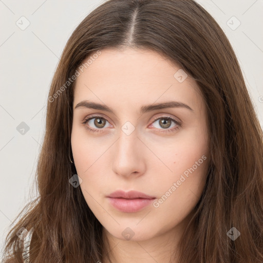 Neutral white young-adult female with long  brown hair and brown eyes