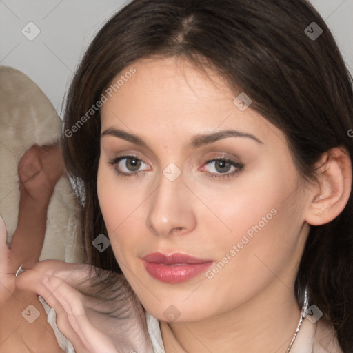 Neutral white young-adult female with medium  brown hair and brown eyes