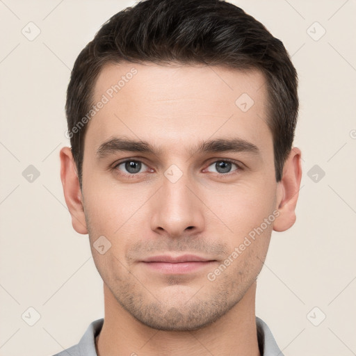 Neutral white young-adult male with short  brown hair and brown eyes