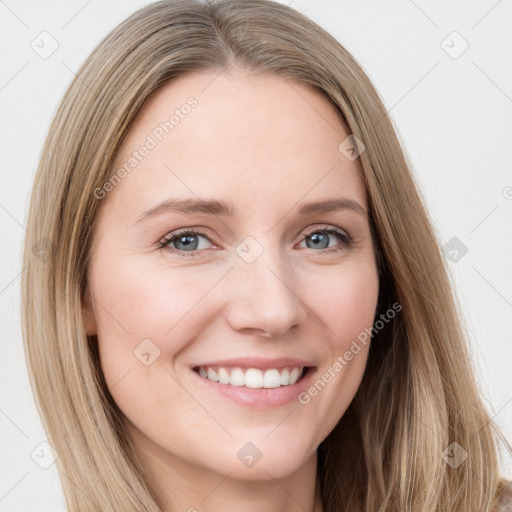 Joyful white young-adult female with long  brown hair and grey eyes