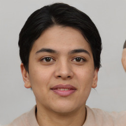 Joyful asian young-adult female with short  brown hair and brown eyes