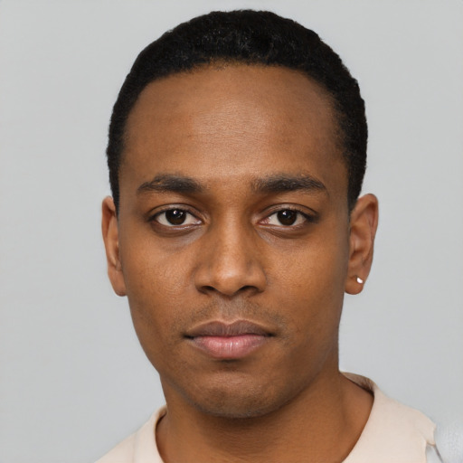 Neutral black young-adult male with short  black hair and brown eyes