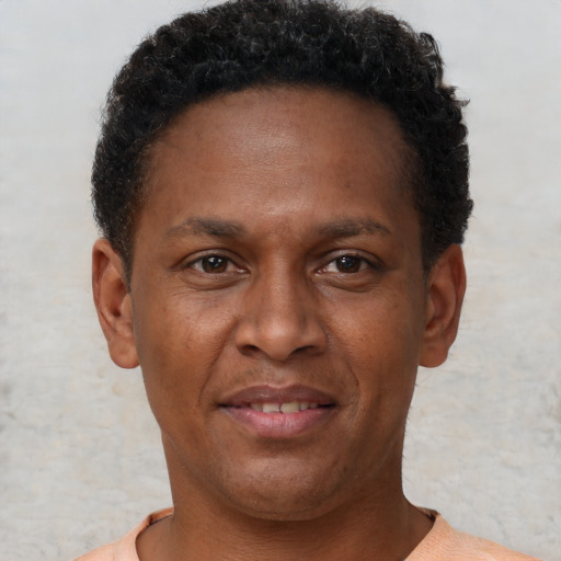 Neutral black young-adult male with short  brown hair and brown eyes