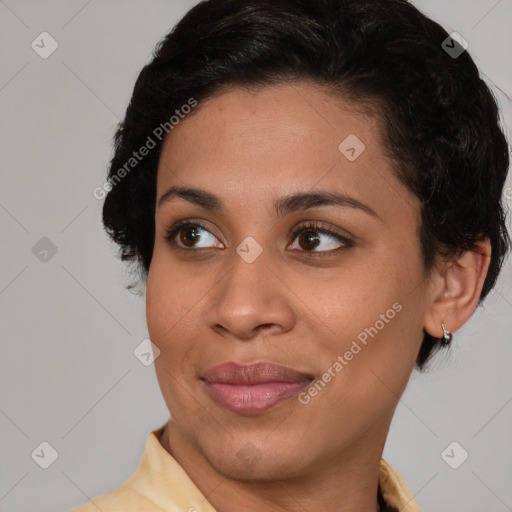 Joyful latino young-adult female with medium  brown hair and brown eyes