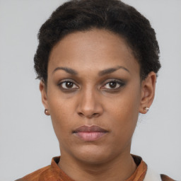 Neutral black young-adult female with short  brown hair and brown eyes