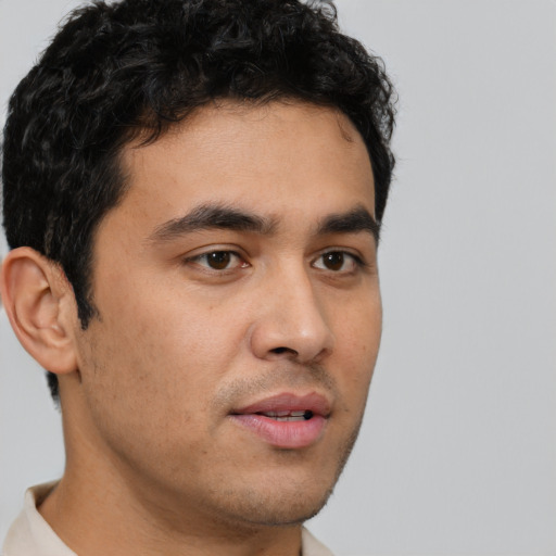 Neutral white young-adult male with short  black hair and brown eyes