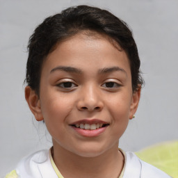 Joyful white child female with short  brown hair and brown eyes