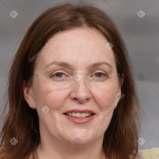 Joyful white adult female with medium  brown hair and brown eyes