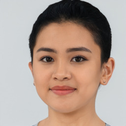 Joyful asian young-adult female with short  black hair and brown eyes