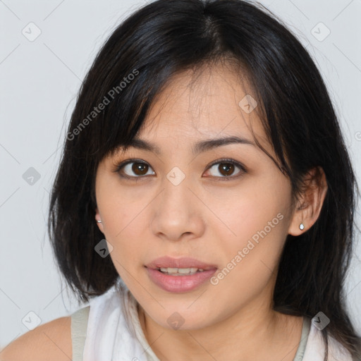 Joyful asian young-adult female with medium  brown hair and brown eyes