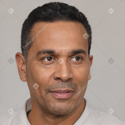 Neutral latino adult male with short  black hair and brown eyes