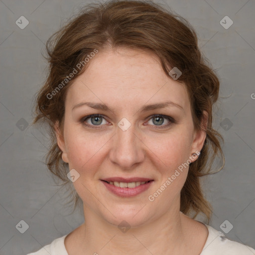 Joyful white adult female with medium  brown hair and grey eyes