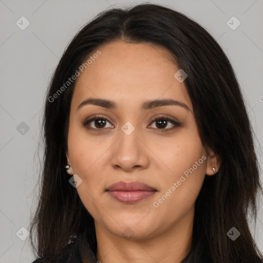 Joyful latino young-adult female with long  brown hair and brown eyes