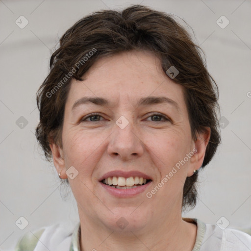 Joyful white adult female with short  brown hair and brown eyes