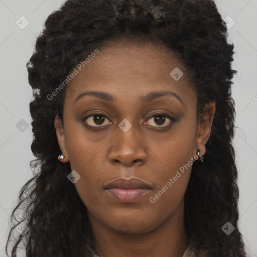 Neutral black young-adult female with long  brown hair and brown eyes