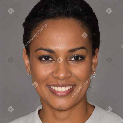 Joyful black young-adult female with short  black hair and brown eyes