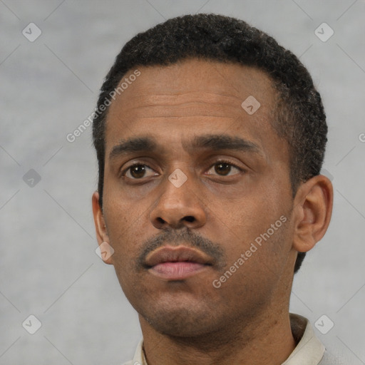 Neutral black young-adult male with short  black hair and brown eyes