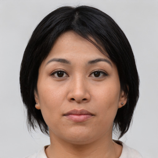 Neutral asian young-adult female with medium  black hair and brown eyes