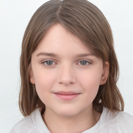 Joyful white child female with medium  brown hair and brown eyes