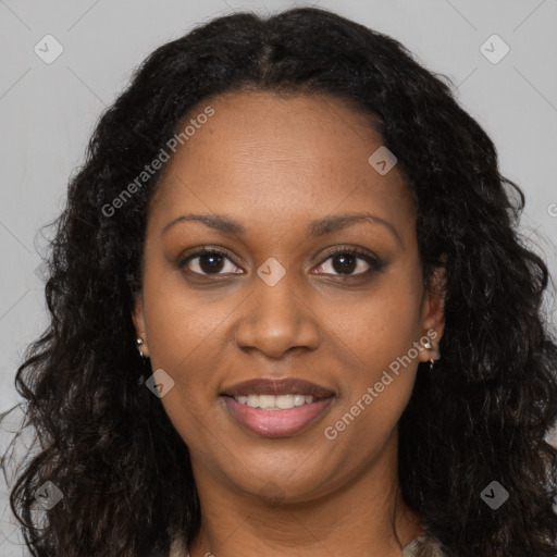 Joyful black young-adult female with long  brown hair and brown eyes