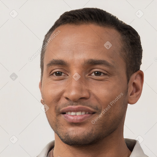 Joyful white young-adult male with short  brown hair and brown eyes