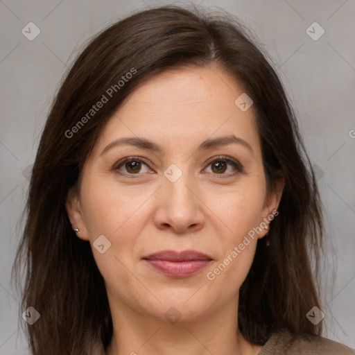 Joyful white adult female with medium  brown hair and brown eyes