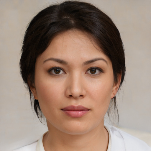 Neutral asian young-adult female with medium  brown hair and brown eyes