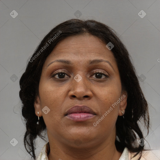 Neutral black adult female with medium  brown hair and brown eyes