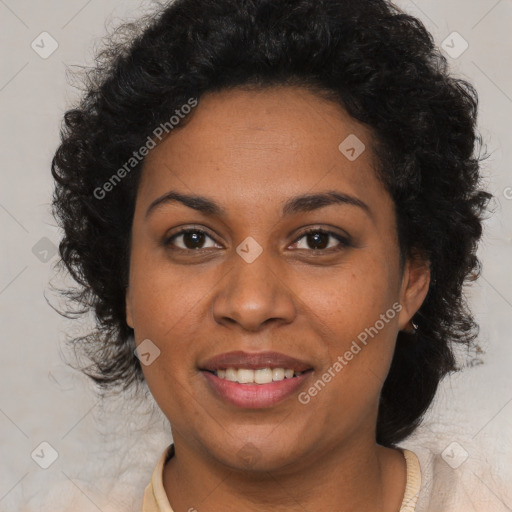 Joyful black young-adult female with long  brown hair and brown eyes