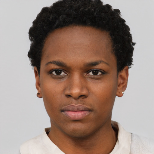 Neutral black young-adult female with short  black hair and brown eyes