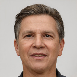 Joyful white middle-aged male with short  brown hair and brown eyes