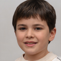 Joyful white child male with short  brown hair and brown eyes